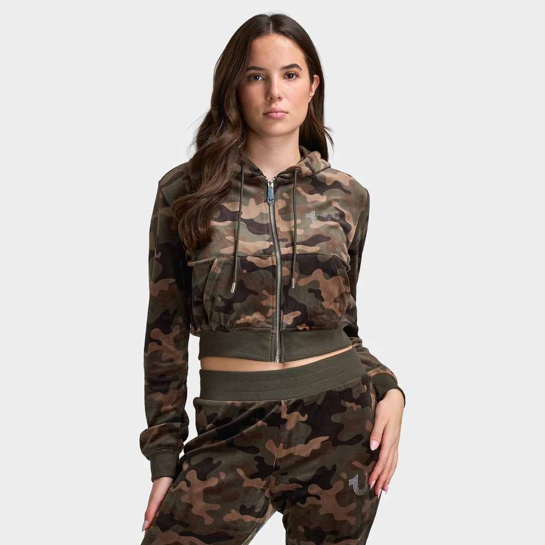 Woman wears True Religion Women's Velour Shrunken Hoodie "Brown Camo". Shop Women's Clothing now at JD Sports