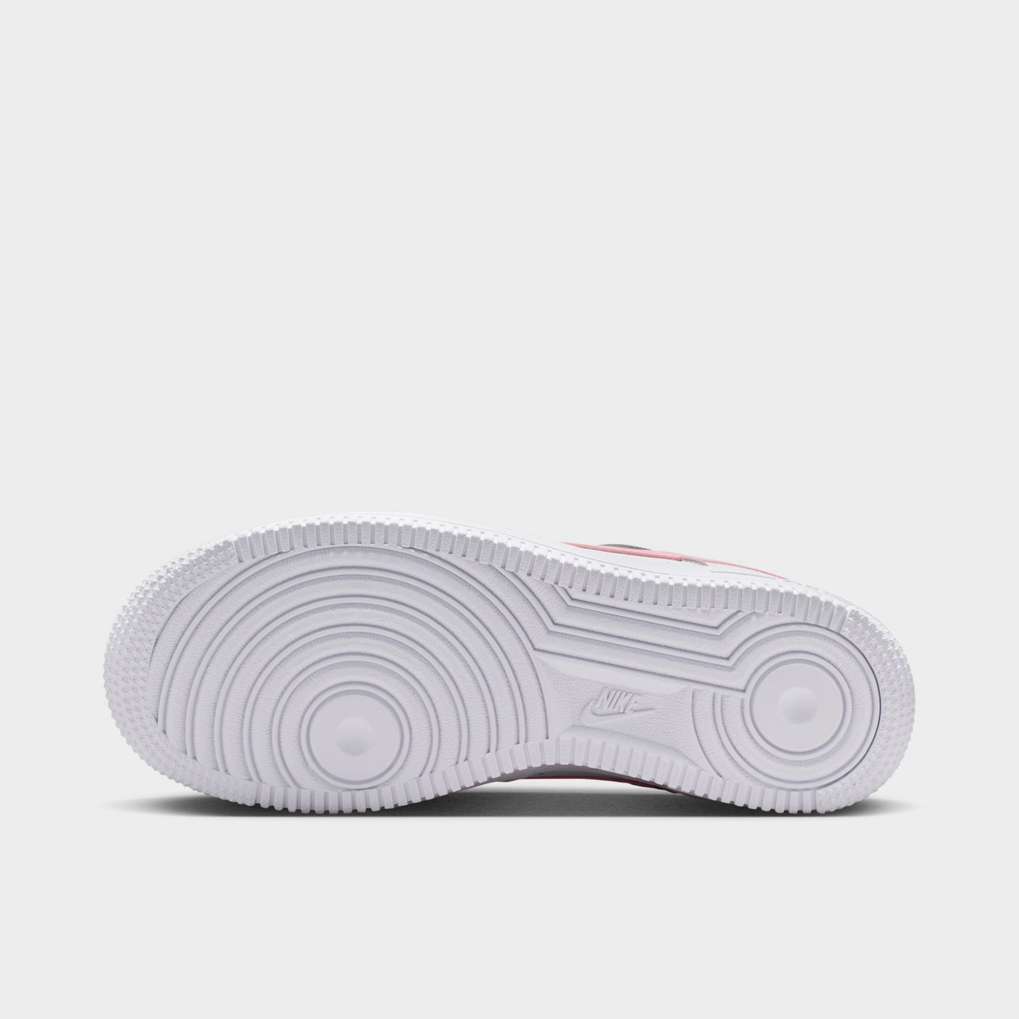 white nike with pink bottom