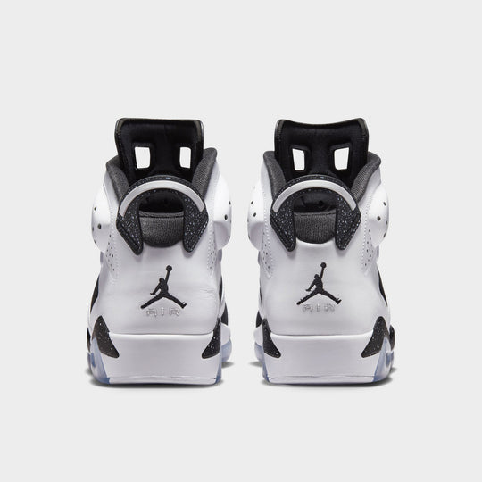 Jordan 6 Retro GS. Rear view of the pair in white, chrome and black showing the heel tabs and back branding details.