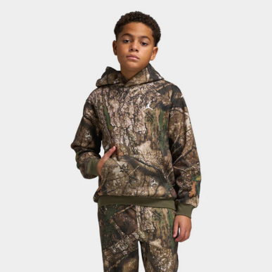 Kide wears Jordan Juniors MJ MVP Fleece Pullover Hoodie “Medium Olive Camo” hoodie. Shop Kids’ Clothing now at JD Sports.