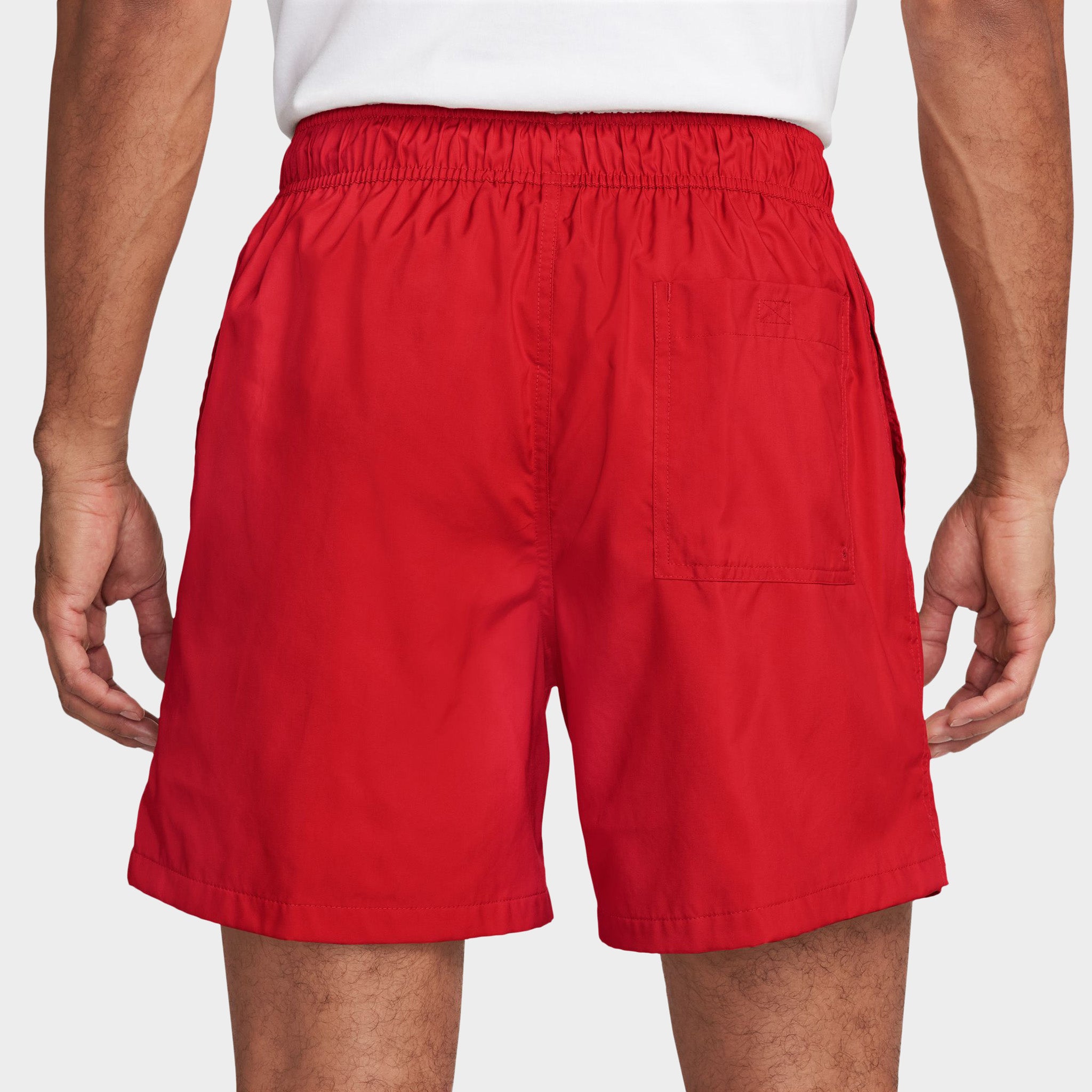 nike club essentials woven flow shorts red