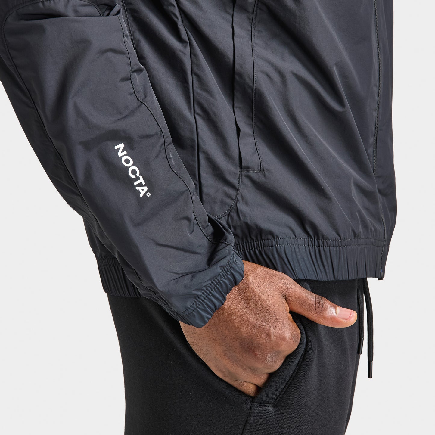 Nike Nocta NRG Cardinal Veste de course tissé Noir / Blanc 