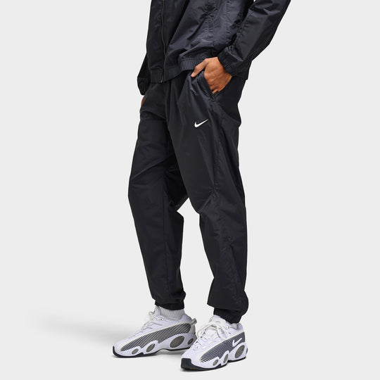 Nike Nocta Cardinal Woven Track Pants Black / White