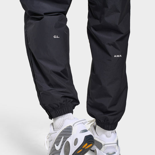 Nike Nocta Cardinal Woven Track Pants Black / White