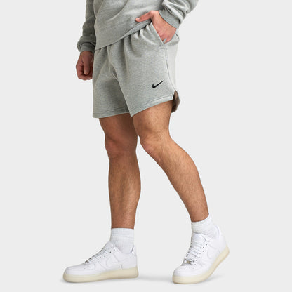 Nike Hommes NOCTA Short polaire gris chiné foncé / MSLVR - Noir