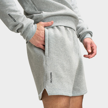 Nike Hommes NOCTA Short polaire gris chiné foncé / MSLVR - Noir