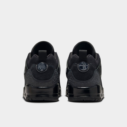 Jordan Spizike Low. Rear view of black and anthracite sneakers with padded heel panels and tonal branding.