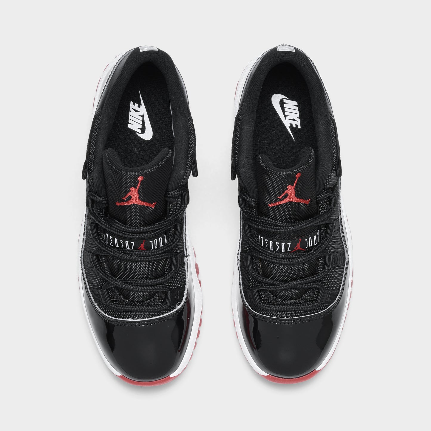 Jordan 11 Retro Low PS Black / Varsity Red - White