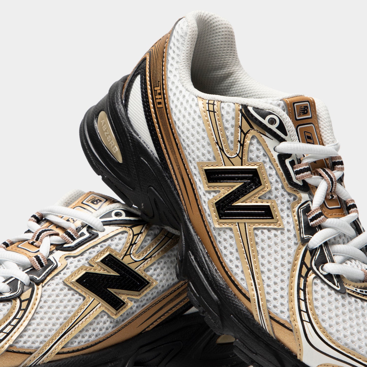 New Balance Junior 740 Sel de Mer / Noir - Or métallique