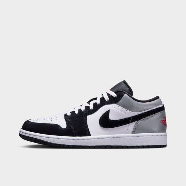 red black and white low top jordans 1