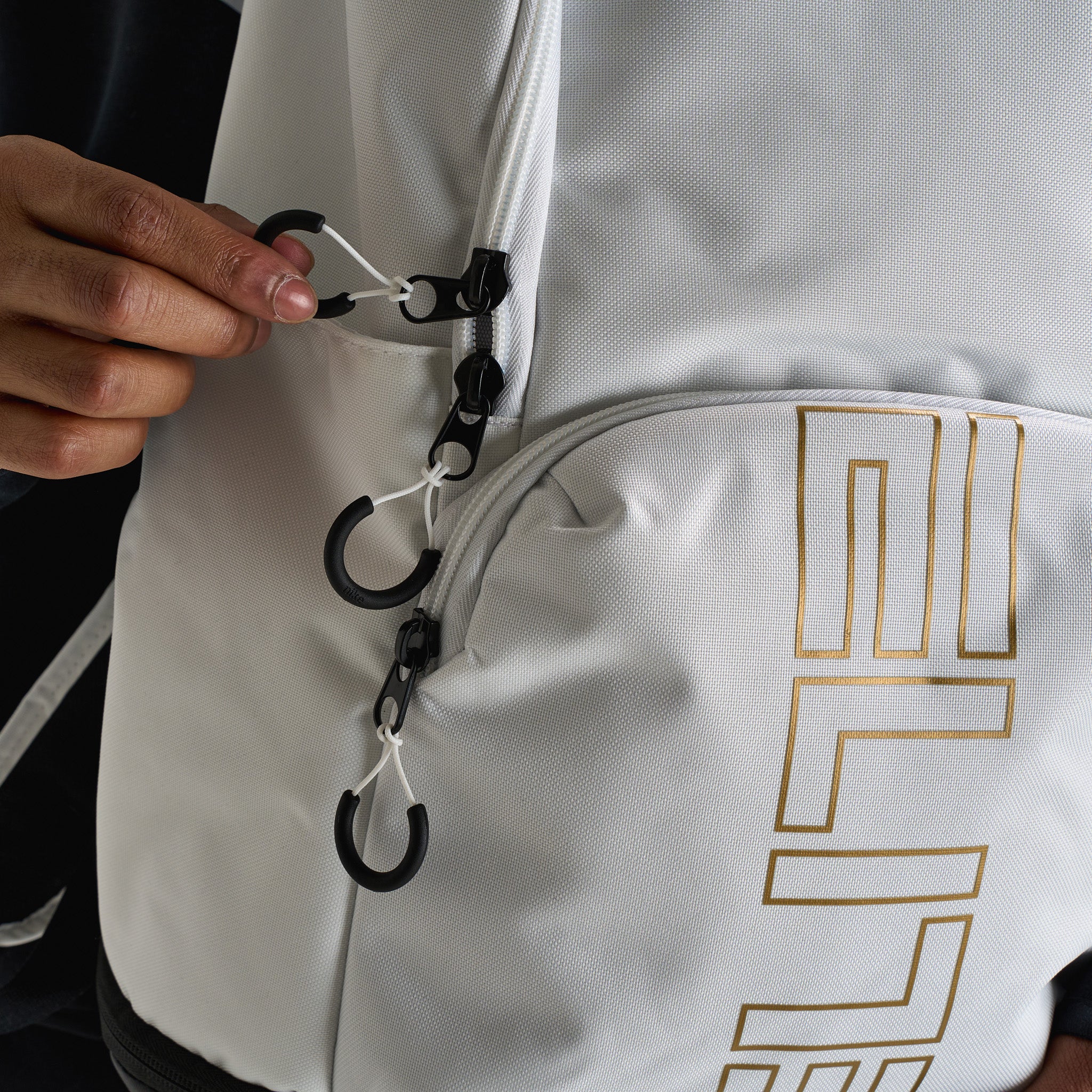 nike backpack white and gold