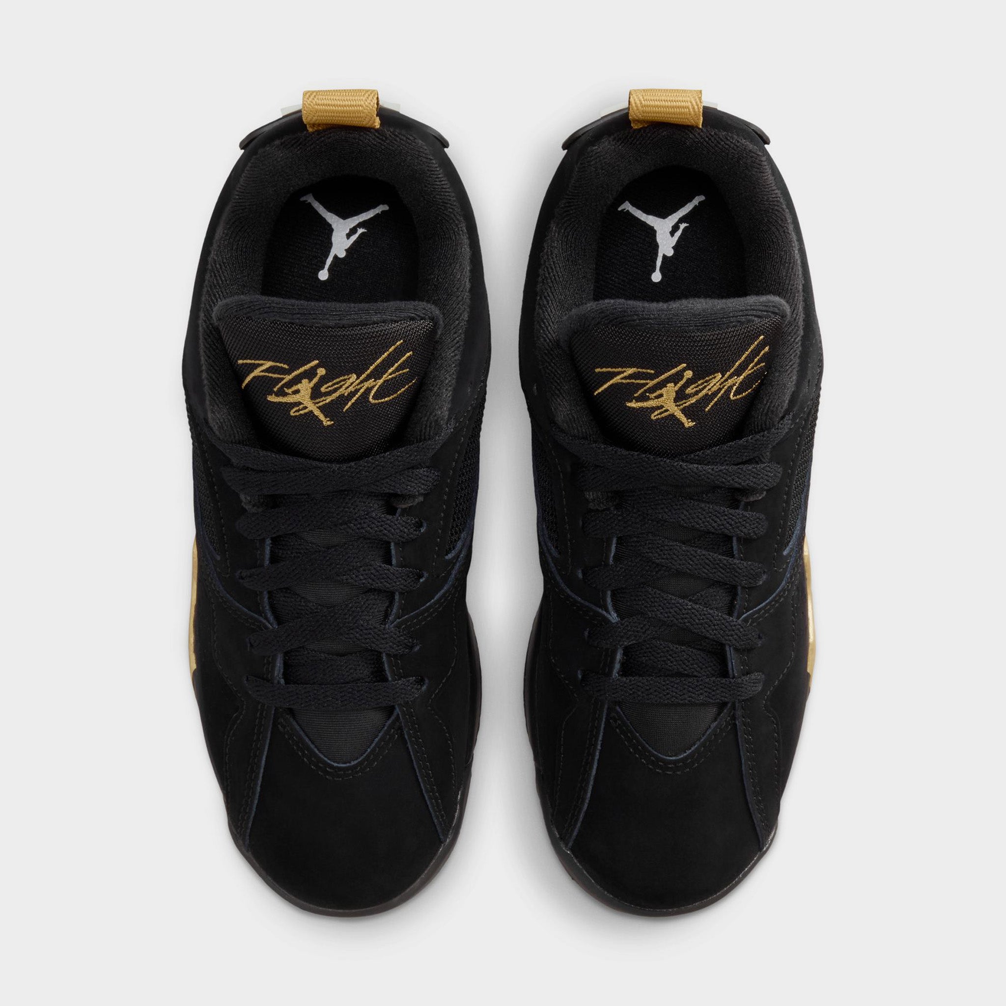 gold and black jordan 7s