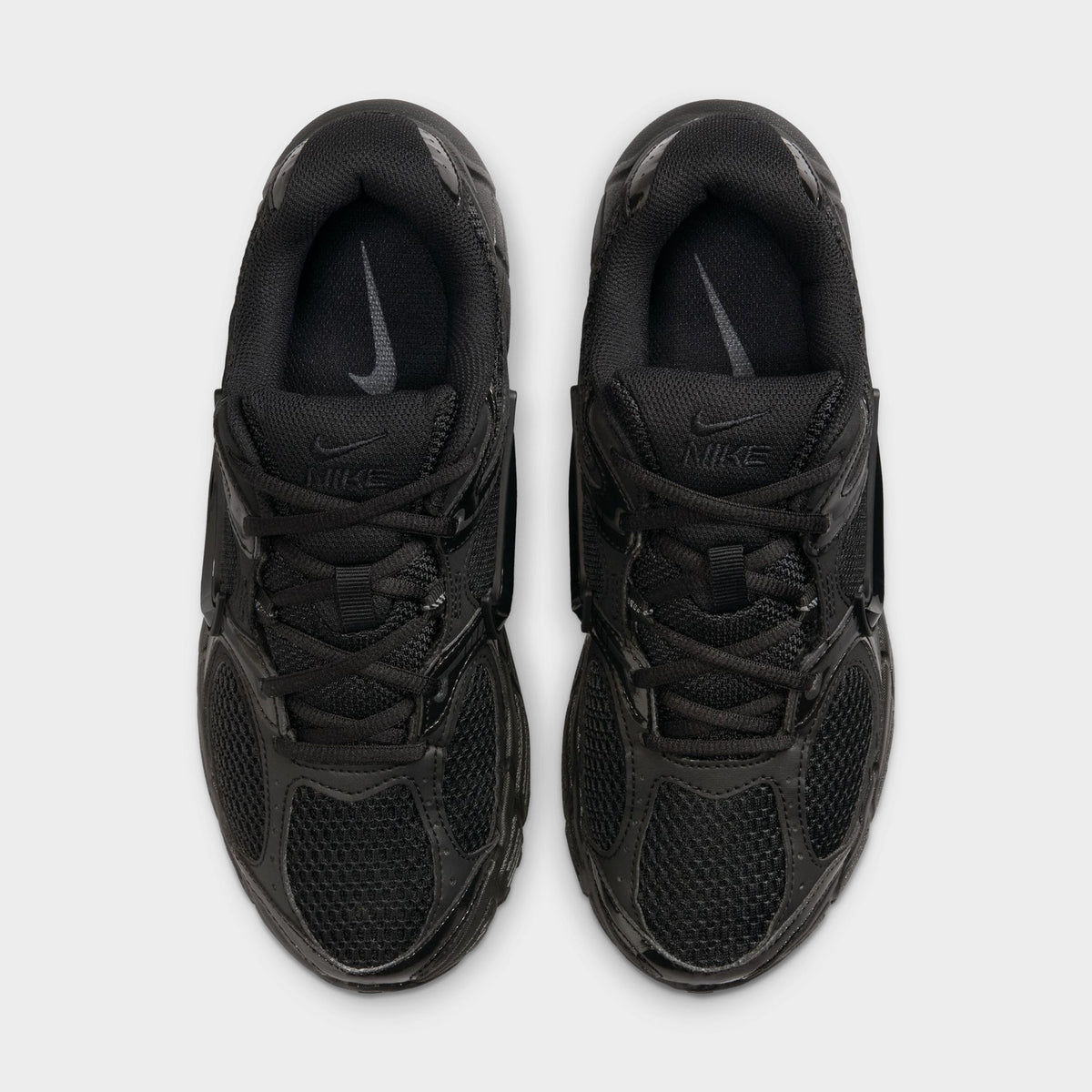 Nike Women's V5 RNR. Top view of black and anthracite sneakers showing black laces, padded tongues and mesh toe boxes.