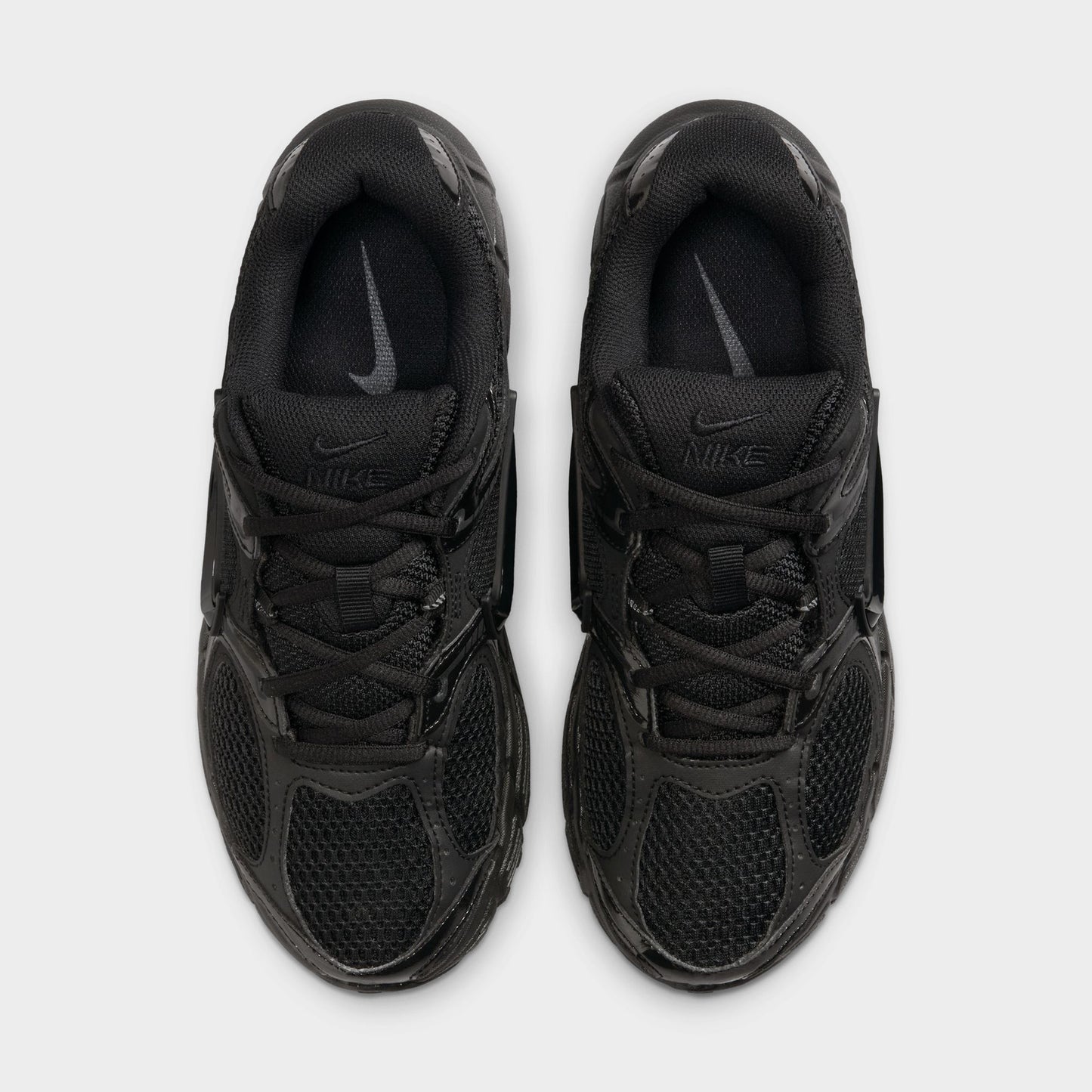 Nike Women's V5 RNR. Top view of black and anthracite sneakers showing black laces, padded tongues and mesh toe boxes.