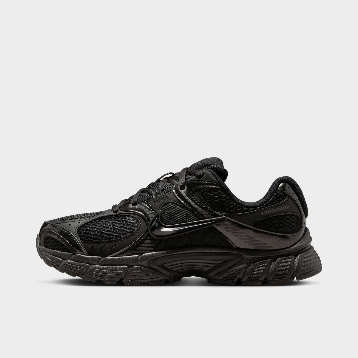 Nike Women's V5 RNR. Side view of black and anthracite sneaker with mesh panels, tonal Swoosh and sculpted sole.