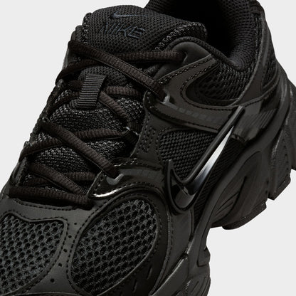 Nike Women's V5 RNR. Close-up of black and anthracite sneaker showing black laces, mesh toe box and glossy overlays.