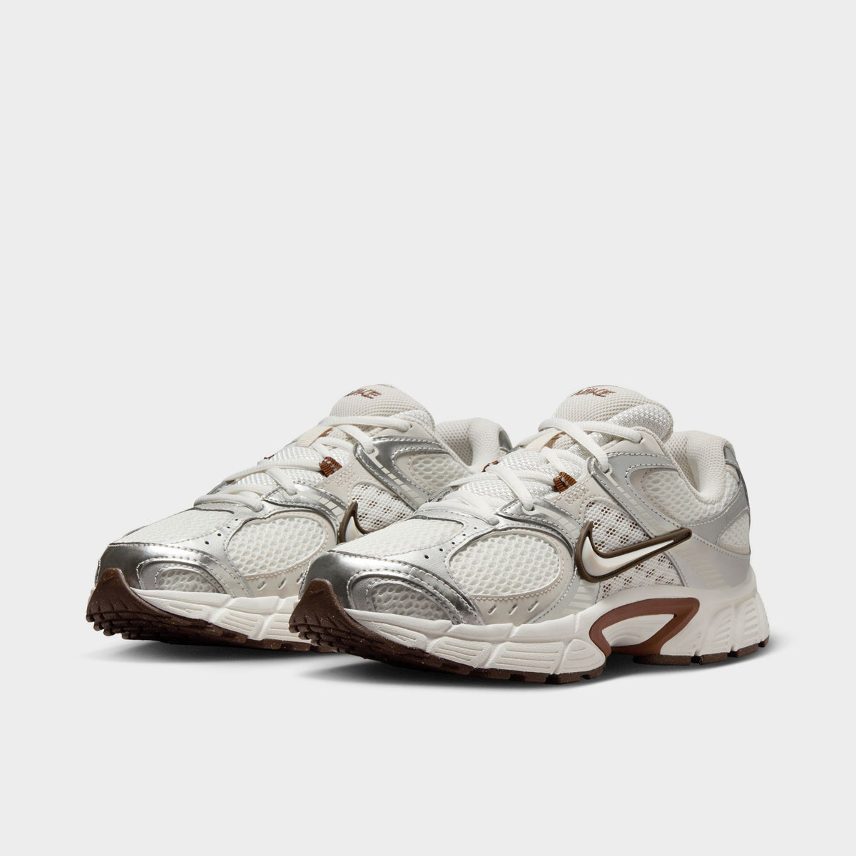 Nike Women's V5 RNR Salt / Light Orewood Brown - Fauna Brown angled view, cream and brown sneakers with layered panels, laces and Nike branding.