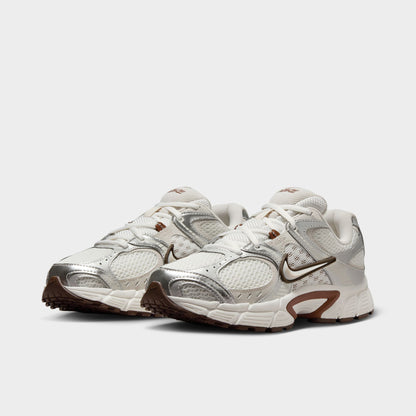 Nike Women's V5 RNR Salt / Light Orewood Brown - Fauna Brown angled view, cream and brown sneakers with layered panels, laces and Nike branding.