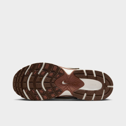 Nike Women's V5 RNR Salt / Light Orewood Brown - Fauna Brown outsole view, cream and brown sneaker showing segmented brown tread and Nike branding.