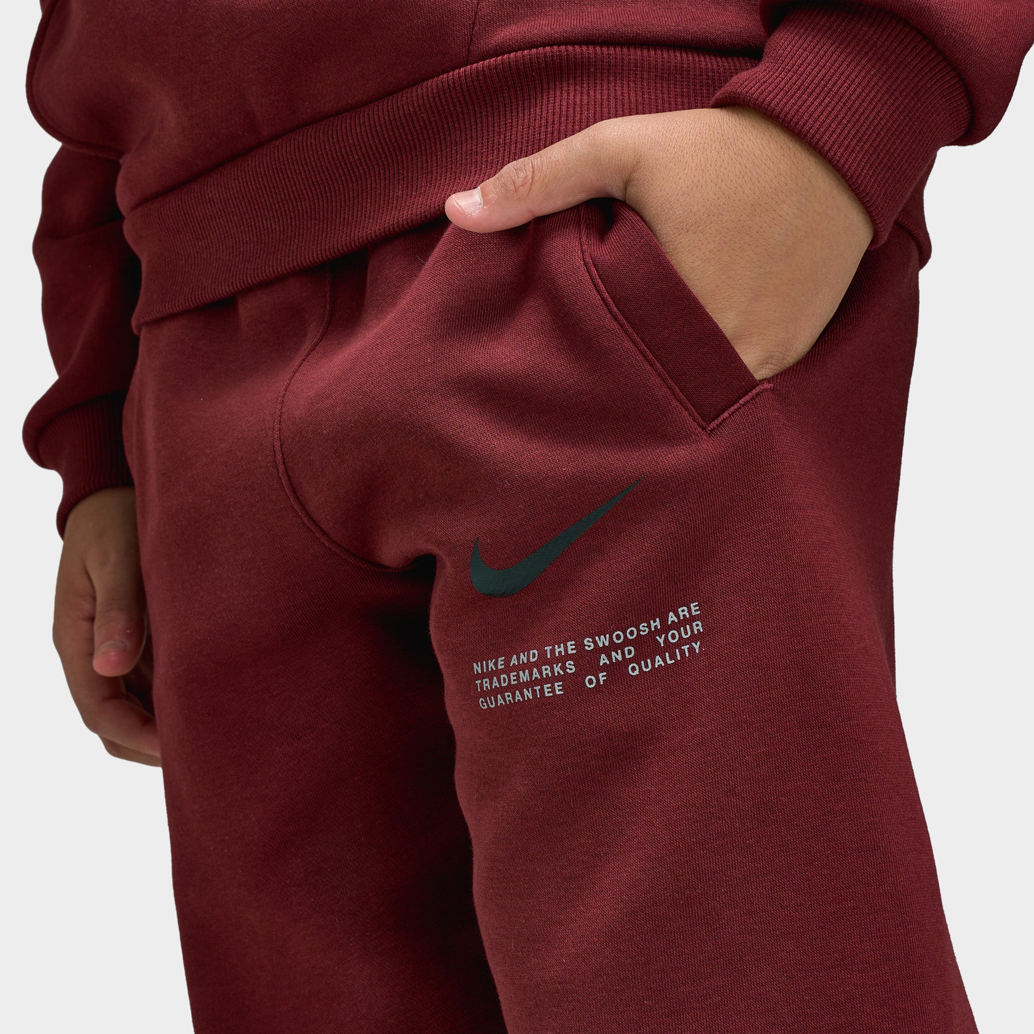 red nike double swoosh joggers