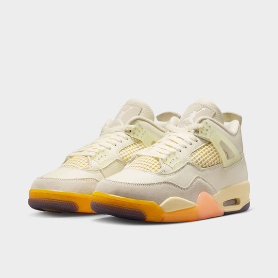 Jordan Women’s 4 Retro. Three-quarter view of Coconut Milk, Muslin, and Bright Mango sneakers with an Encapsulated Air-Sole unit.