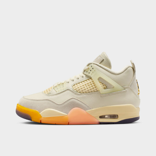 Jordan Women’s 4 Retro. Side view of Coconut Milk, Muslin, and Bright Mango sneakers with an Encapsulated Air-Sole unit.