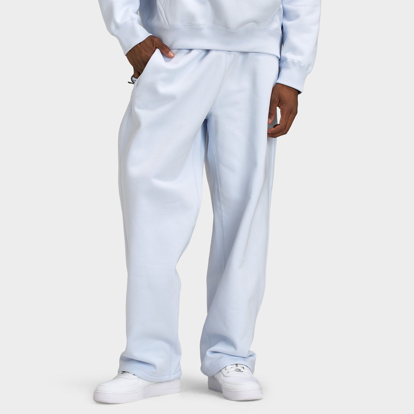 Nike Solo Swoosh Pantalon à ourlet ouvert / Gris football
