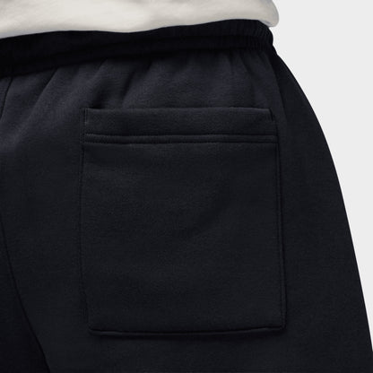 Jordan Brooklyn Pantalon à Ourlet Ouvert Surdimensionné Polaire / Noir