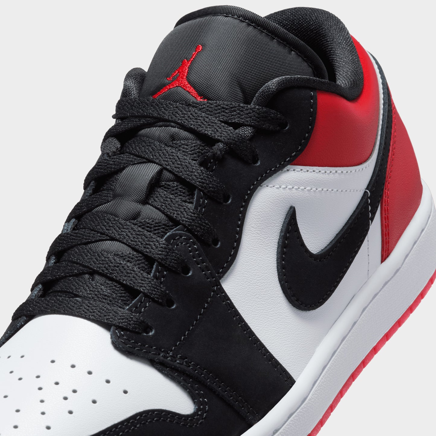 Jordan 1 Low White / Black - Varsity Red