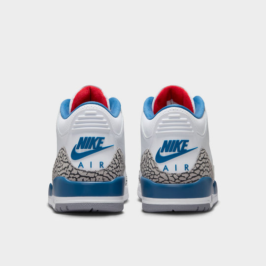 Jordan 3 Retro. Rear view of White, True Blue, and Fire Red sneaker with Nike Air branding on heel.