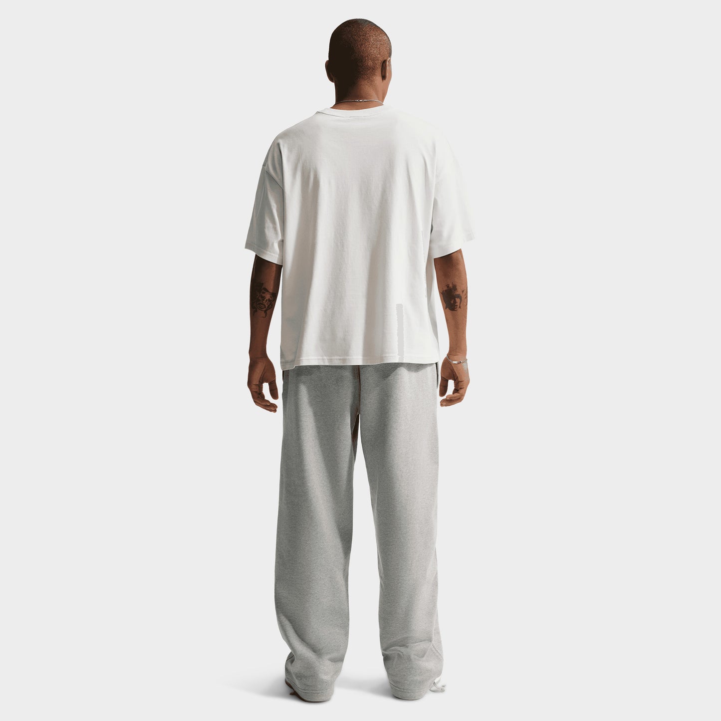 Nike Solo Swoosh Pantalon Polaire à ourlet ouvert / Gris Chiné