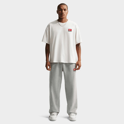 Nike Solo Swoosh Pantalon Polaire à ourlet ouvert / Gris Chiné