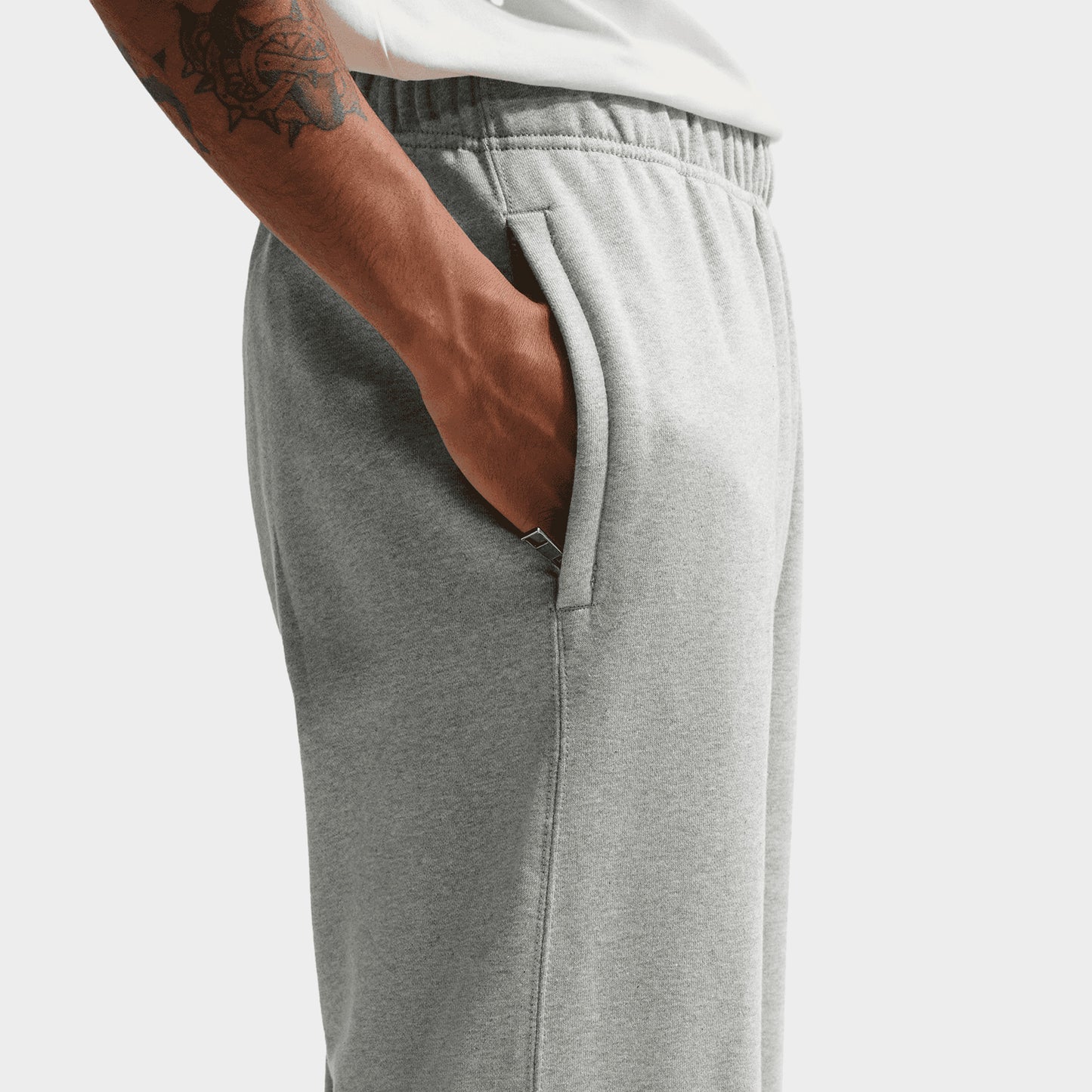 Nike Solo Swoosh Pantalon Polaire à ourlet ouvert / Gris Chiné