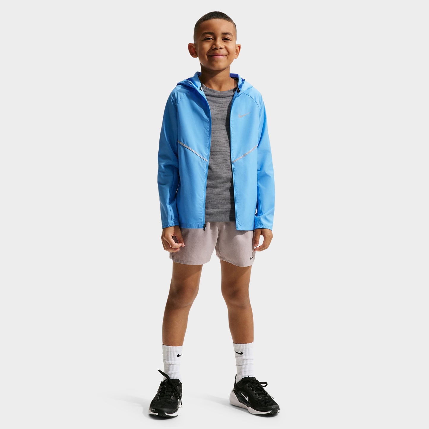 Nike Juniors' UV + Repelent Miler Jacket University Blue / Reflective Silver