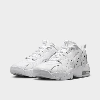 Nike Air DT Max '96 Low. Three-quarter view of white and metallic silver sneakers with white laces, layered uppers and visible Air units.