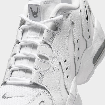 Nike Air DT Max '96 Low. Close-up of white and metallic silver sneaker showing white laces, layered panels and perforated upper details.
