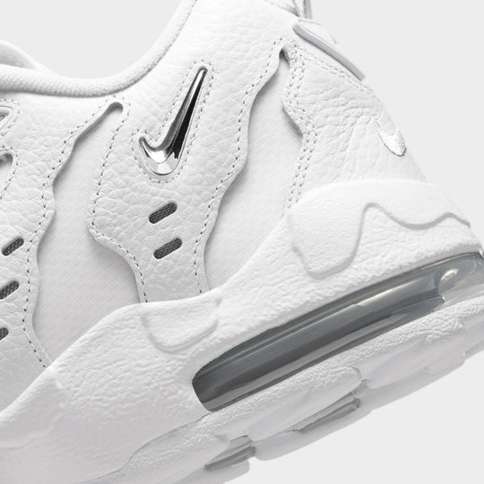 Nike Air DT Max '96 Low. Close-up of white and metallic silver sneaker showing sculpted heel panels and visible Air cushioning.