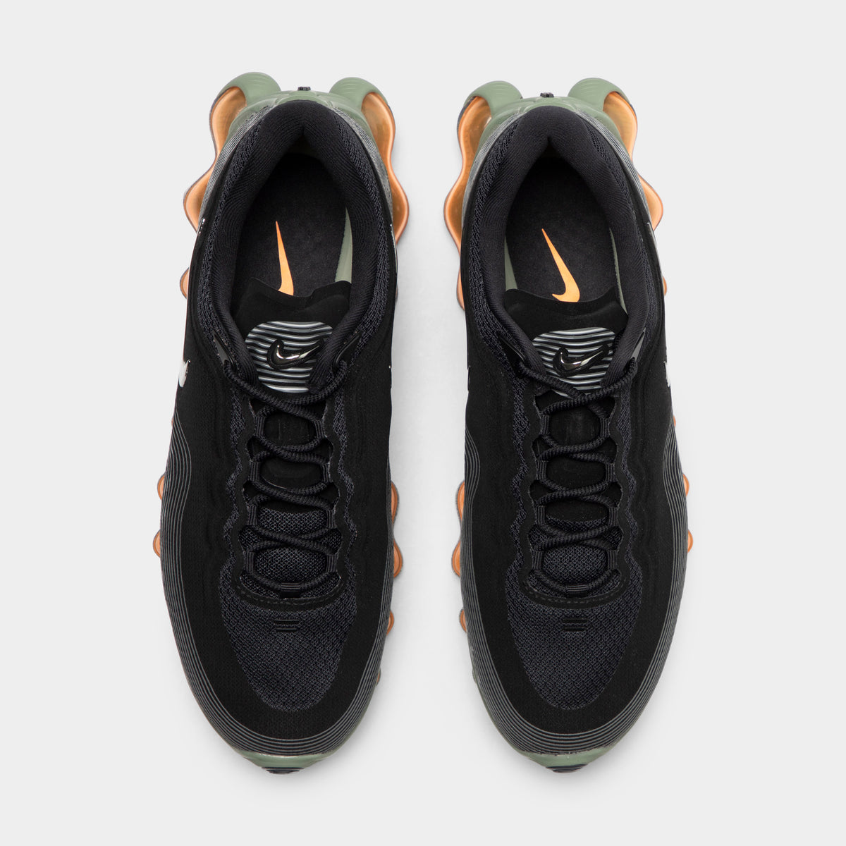 Nike Air Liquid Max. Top view of black, metallic silver and light army sneakers showing black laces, padded tongues and light army heel accents.
