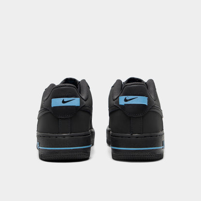 Nike Air Force 1 GS. Rear view of pair of low-top sneakers showing anthracite heel counters, football blue heel tabs with black Nike branding, and anthracite midsoles with blue accent lines. 