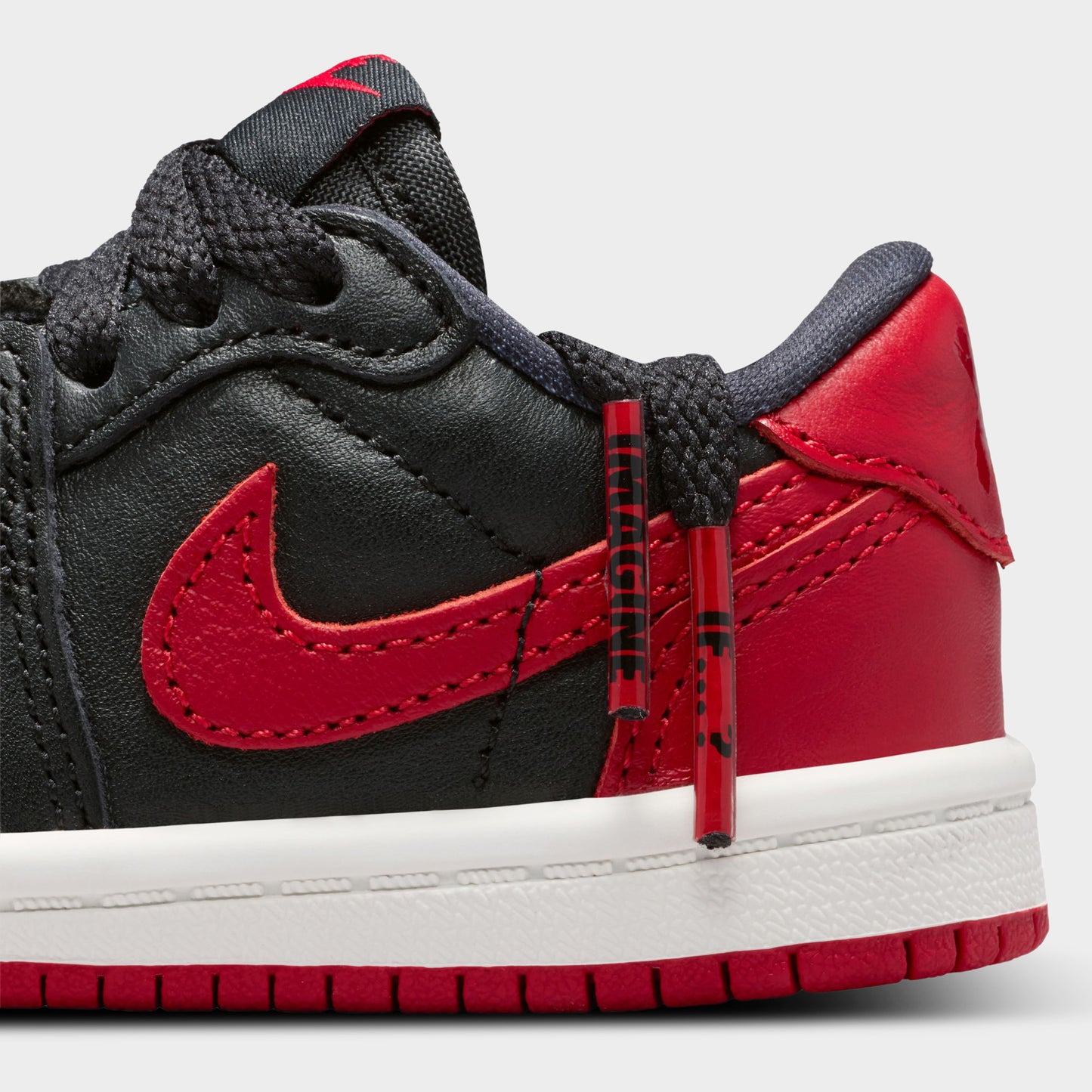 Jordan 1 Low OG Retro TD Noir / Noir - Rouge Universitaire