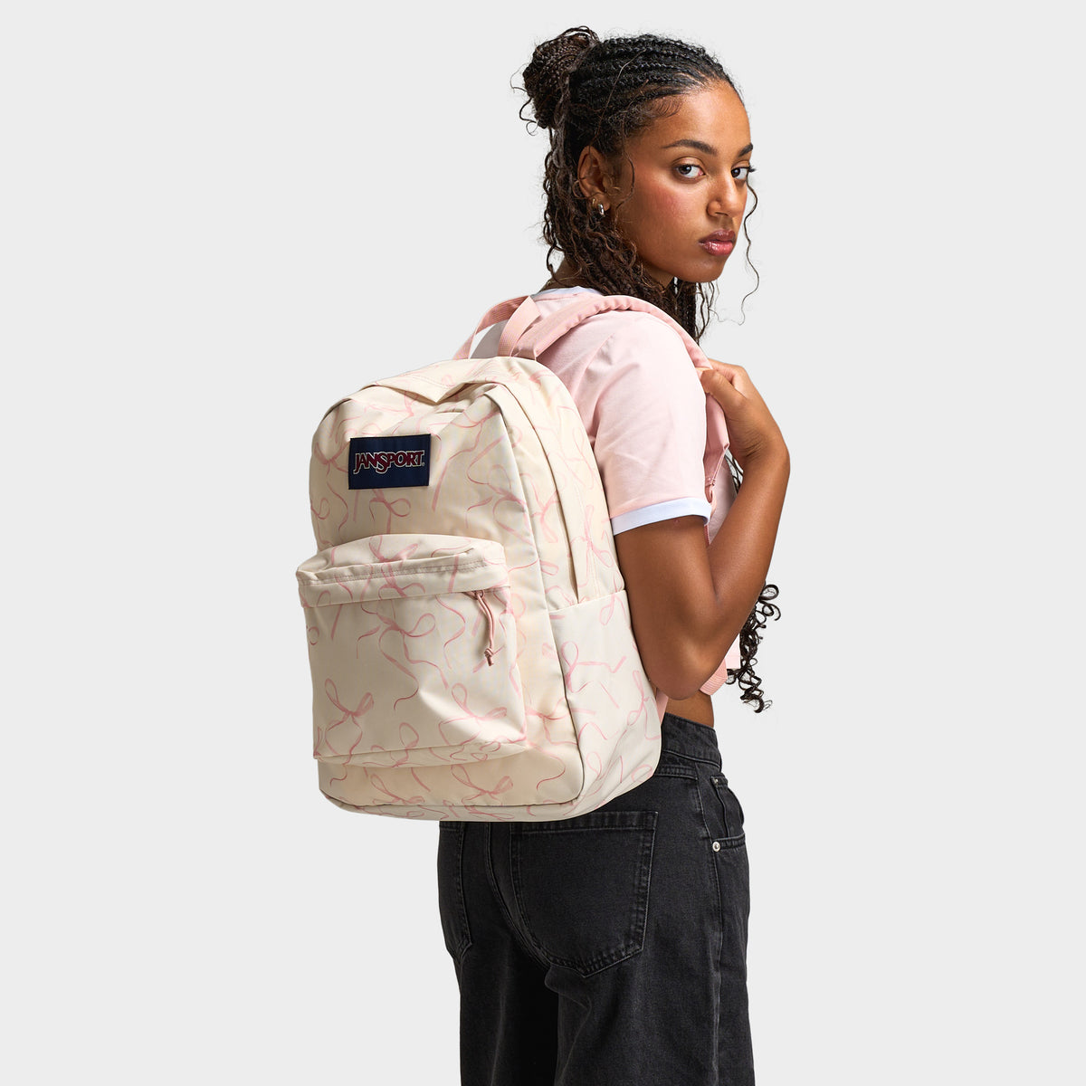 jansport backpack on woman JanSport SuperBreak Plus Backpack / Rows of Bows – JD Sports