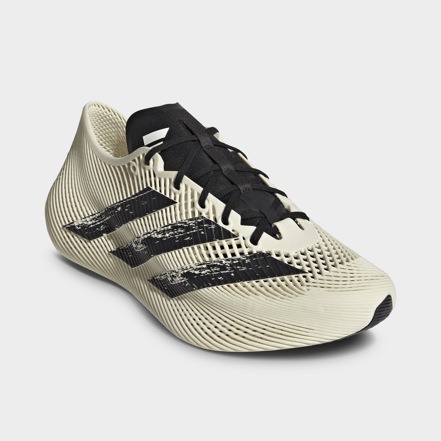adidas Climacool Laced. Three-quarter view of off white and black sneakers with black laces, woven uppers and black three stripes.