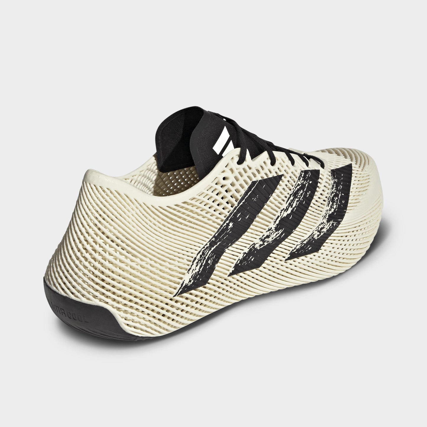 adidas Climacool Laced. Rear three-quarter view of off white and black sneaker with black heel panel, woven upper and sculpted sole.