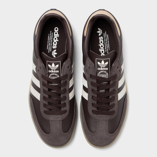 adidas Samba. Top view of aurora coffee, core white and magic beige sneakers showing brown laces, padded tongues and light interior details.