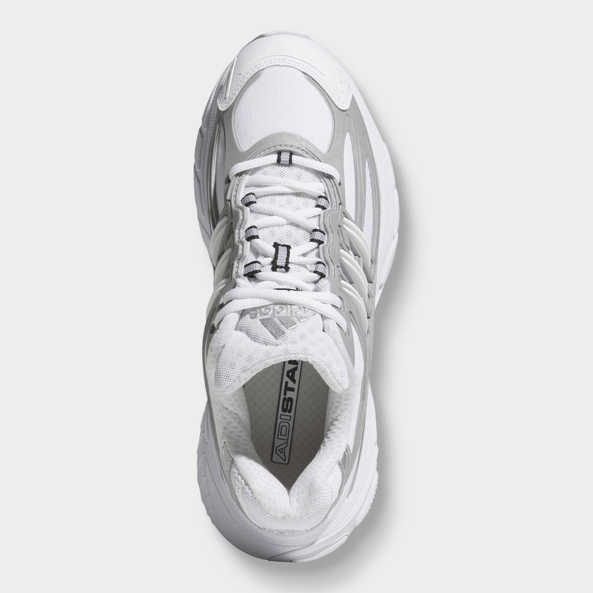 adidas Adistar XLG 2.0. Top view of footwear white and silver metallic sneaker showing white laces, padded tongue and collar.