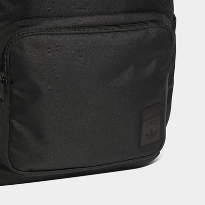 adidas Premise 2.0 Backpack. Close-up of black backpack showing smooth fabric panel, stitched seams and tonal finish.