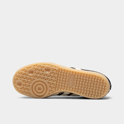 adidas Juniors' Samba OG J. Bottom view of sand strata, ivory and gum junior sneaker showing brown gum outsole with circular forefoot tread.