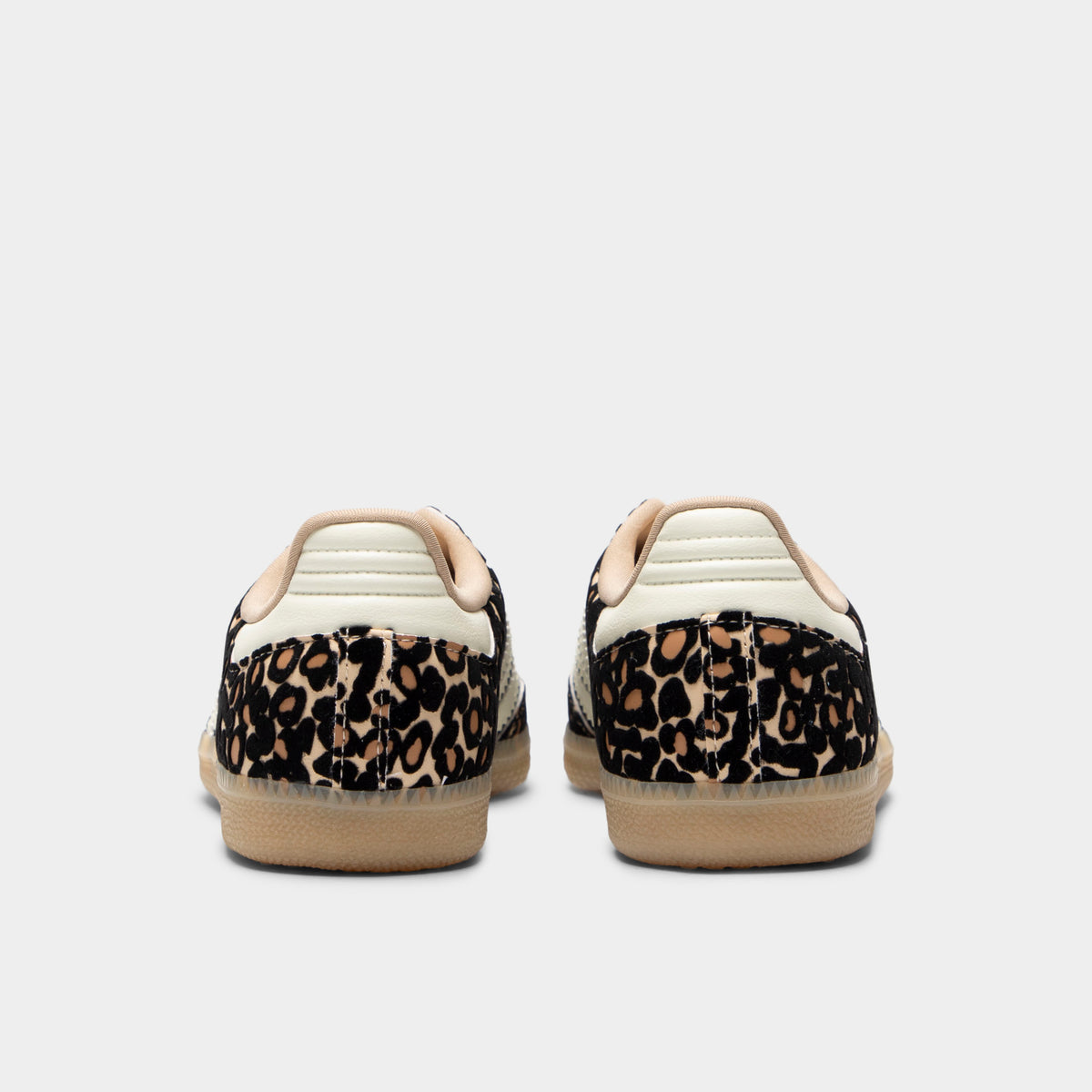 adidas Juniors' Samba OG J. Rear view of sand strata, ivory and gum junior sneakers with light heel tabs, patterned uppers and gum soles.