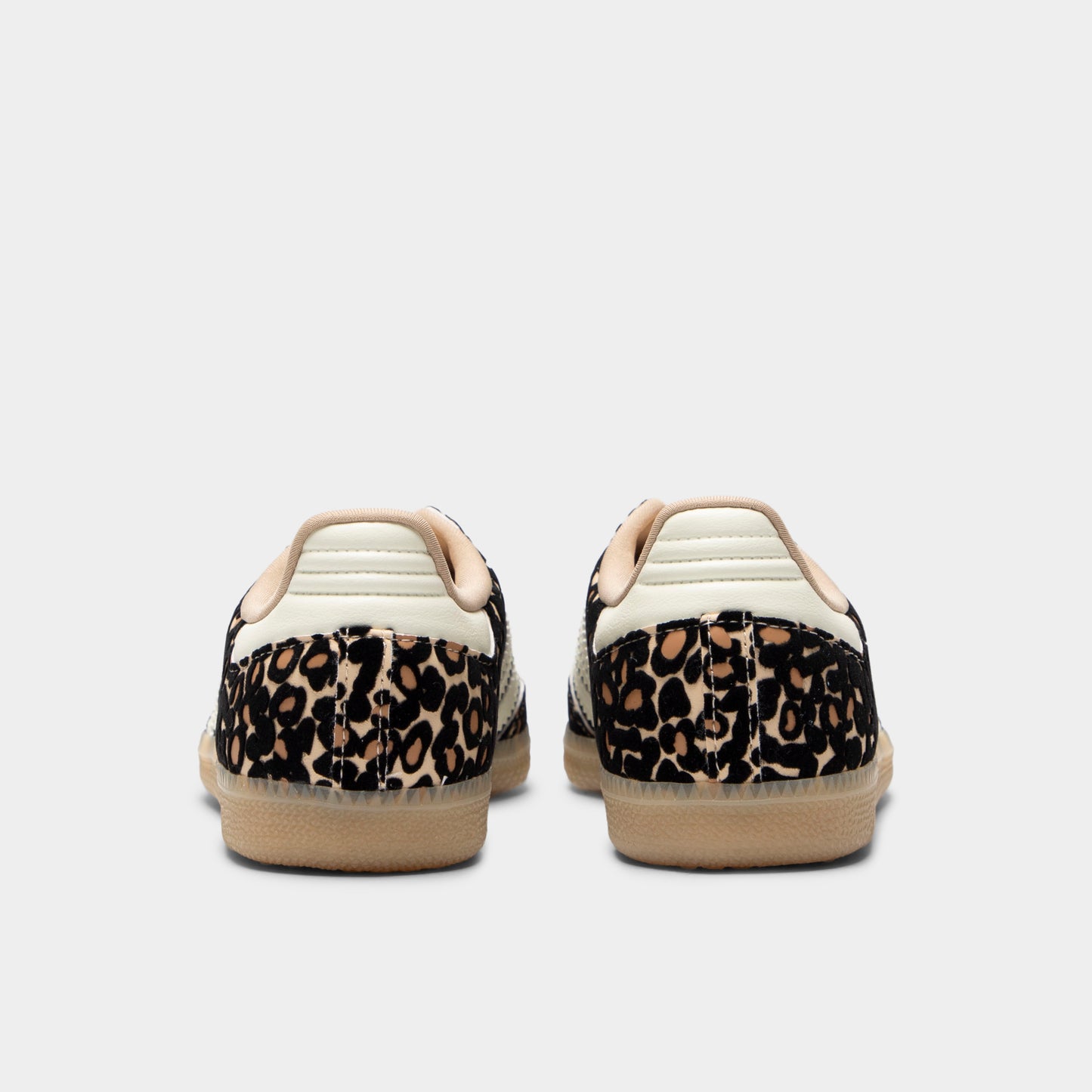 adidas Juniors' Samba OG J. Rear view of sand strata, ivory and gum junior sneakers with light heel tabs, patterned uppers and gum soles.