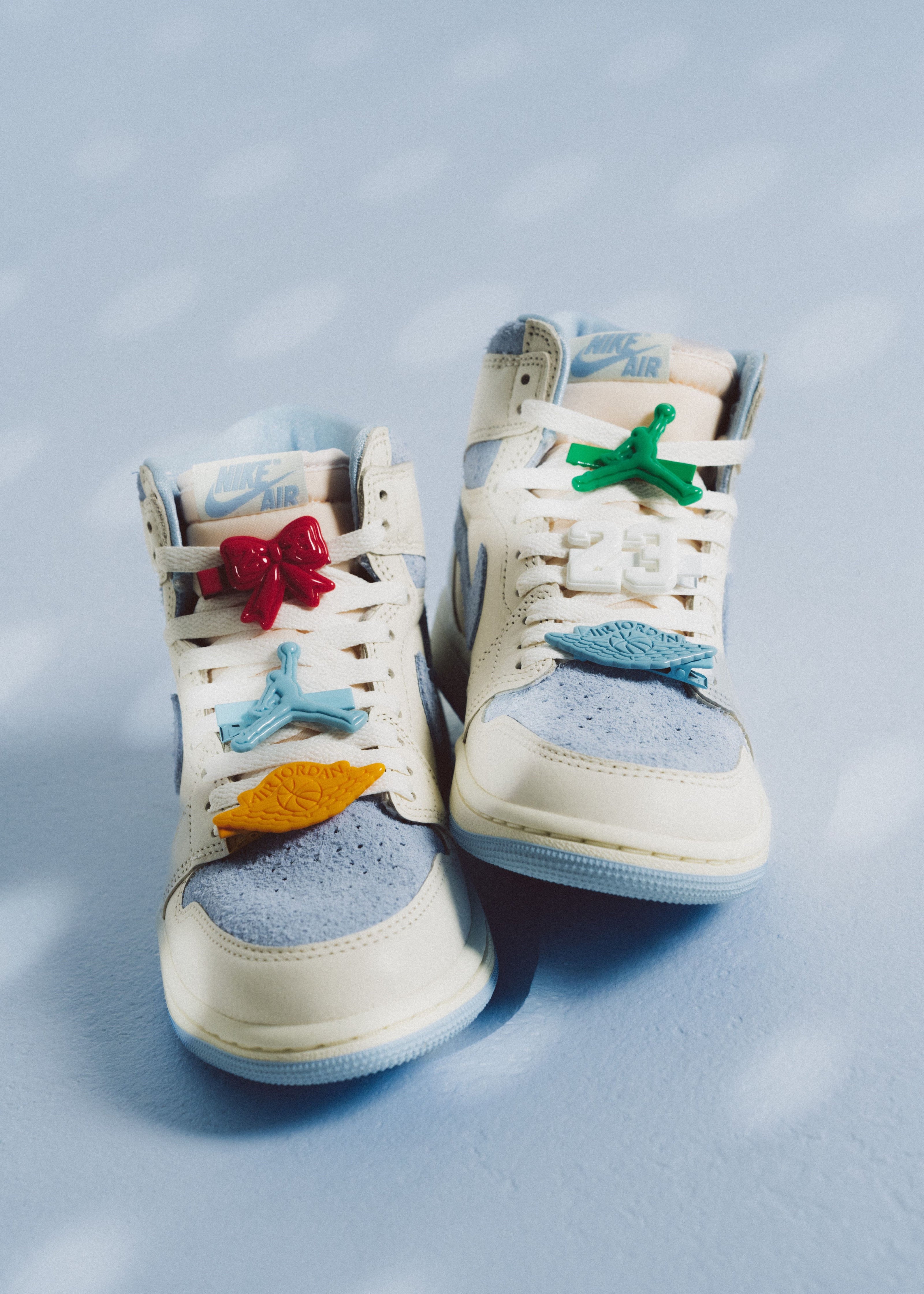 Jordan Women’s 1 Retro High OG “Pale Ivory / Psychic Blue – Coconut Milk” shoe. Shop New Women’s